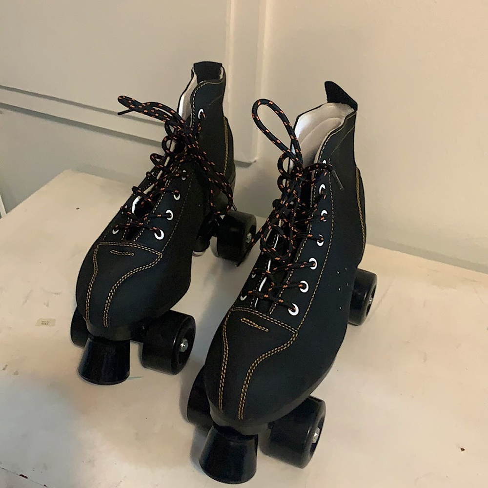 Brand new black roller skates